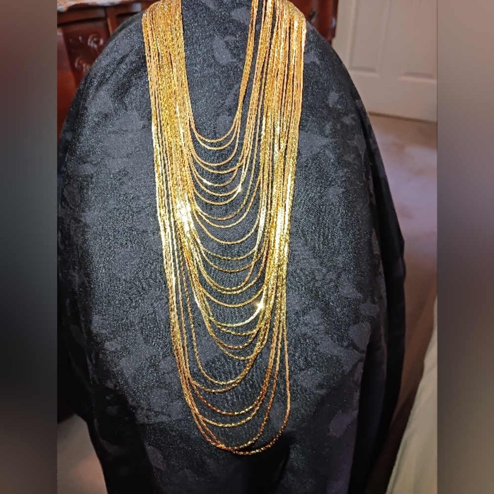 Gold tone multi strand necklace